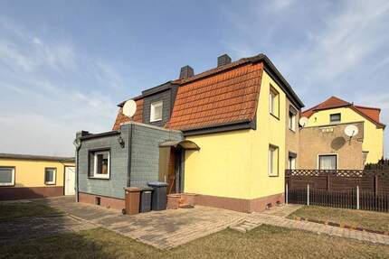 Idyllisches Wohnen in Zscherndorf - Doppelhaushälfte auf zwei Etagen & rund 300 qm Grundstück - Sandersdorf-Brehna