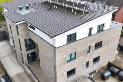 Modernes Open-Living in Norderstedt-Garstedt: Großzügige 93 m² mit EBK, Aufzug & Tiefgarage