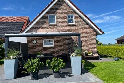 FREI bis 3.5.26 Ferienwohnung mit Terasse u.Kanallage in Wiesmoor