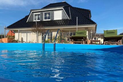 Sibbesse: Topmodernes Einfamilienhaus mit Pool, Wintergarten, PV