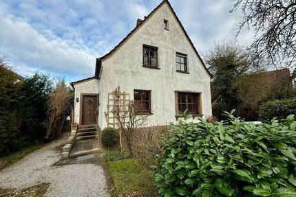Menden: Freistehendes Wohnhaus mit dem Zauber der 1950er-Jahre in TOP Lage!