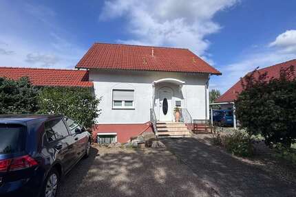 Haus zum Kaufen in Buseck 489.000,00 € 186 m²