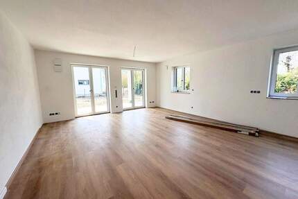 Helle Erdgeschosswohnung mit großzügigem Garten - Großmehring