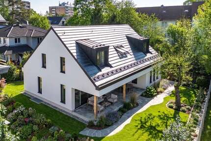 Haus zum Kaufen in Unterföhring 2.380.000,00 € 235 m²