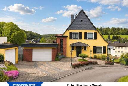 Freistehendes Einfamilienhaus mit Terrasse, zwei Garagen und Garten in ruhiger Wohnlage von Maxsain