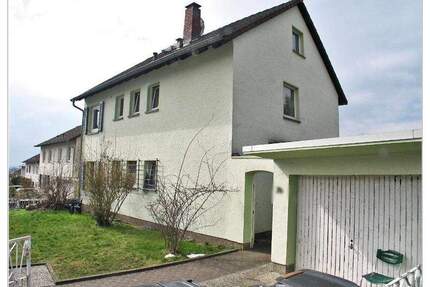 Preisgünstiges Zweifamilienwohnhaus in einer beliebten Wohnlage mit toller Aussicht auf Wiesbaden
