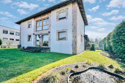 Charmantes Holzhaus trifft modernen Neubau - Ruhige Sackgassenlage in Holle - Erbpacht