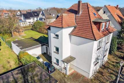 Charmantes Zweifamilienhaus mit traumhaftem Grundstück, Doppelgarage und Balkon in ruhiger Lage vom Mohnspark! - Gütersloh Innenstadt