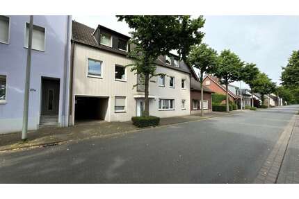 Mehrfamilienhaus mit Potenzial in Dinslaken-Bruch – 5 Wohneinheiten, Garten & Garagen