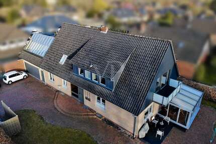 Haus zum Kaufen in Hatten 469.000,00 € 229 m²
