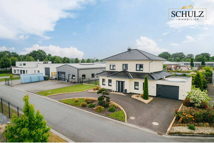 **Vielseitiges Anwesen mit luxuriösem Wohnkomfort und Gewerberaum in Cloppenburg!**