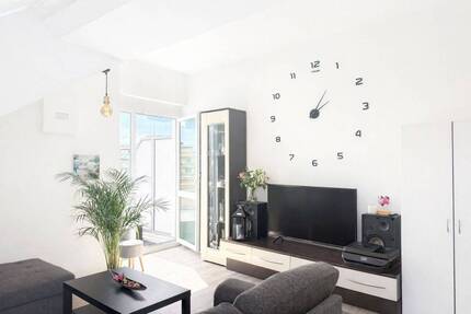 AIGNER - Moderne 2-Zimmer-Dachgeschosswohnung in Germering