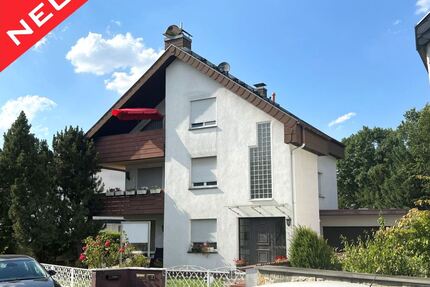 Attraktives Zweifamilienhaus mit Potenzial in bester Lage von Mühlheim!