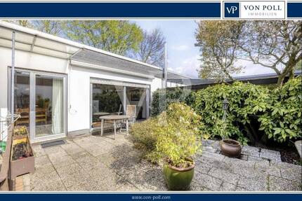 Wohnen im Grünen: Charmanter Bungalow mit Süd-Atrium in Feldrandlage - Köln Esch/Auweiler