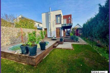 Modernes Familienhaus mit Pool, Doppelgarage und hochwertiger Ausstattung im Zentrum von Bissendorf