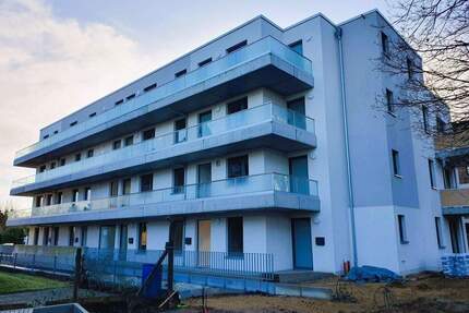 Neubau, Erstbezug | 2-Zimmer-Wohnung mit großem Garten und Tiefgaragenstellplatz - Norderstedt Harksheide