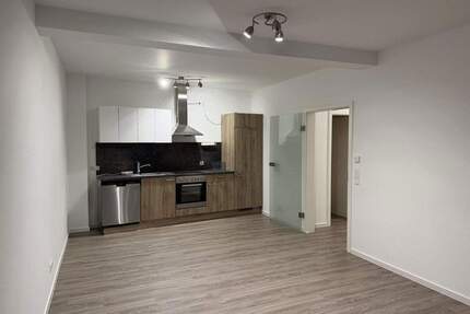 Moderne 2 Zimmer-Wohnung mit Terrasse im Herzen der Volkacher Altstadt