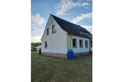 Baugrundstück mit Doppelhaushälfte - Milower Land