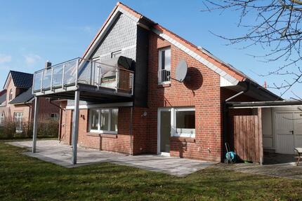 Haushälfte EG: Gartenwohnung 3 Zimmer 109 m² Burg Fehmarn Garten