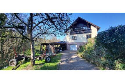 GEPFLEGTES EINFAMILIENHAUS MIT UNVERBAUBARER FERNSICHT IN BELIEBTER HÖHENLAGE MIT GARAGE PLUS WALDGRUNDSTÜCK IN MERZIG-SCHWEMLINGEN