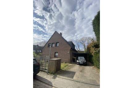 Freistehendes 2-Parteienhaus mit Garage und Garten - Meerbusch Ilverich