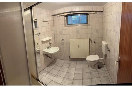 Souterrain-Wohnung mit Wintergarten - Bad Münder am Deister