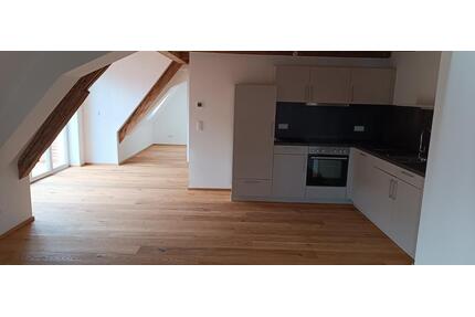 Erstbezug: Stilvolle 3-Zimmer-Maisonette-Wohnung mit Balkon in Oettingen - Oettingen in Bayern