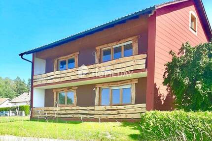 Zweifamilienhaus mit großem Garten und zus. sep. Bauplatz - perfekt für Eigennutzer oder Investoren - Eging a. See Loipfering