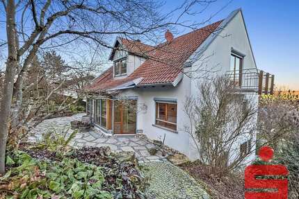 Haus zum Kaufen in Waldbüttelbrunn 599.000,00 € 173 m²