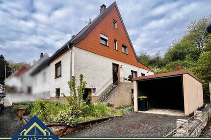 Doppelhaushälfte mit Garten und Garage - Ihr Sanierungsprojekt mit Potenzial in Großrosseln