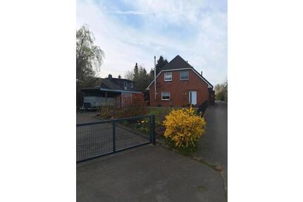 Doppelhaushälfte in Linden zu vermieten mit Garten und Carport