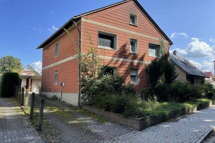 Haus zum Kaufen in Wallenhorst 250.000,00 € 218 m²