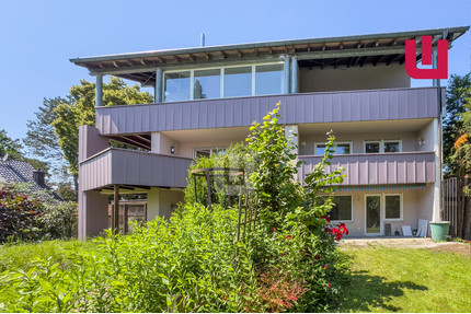 Haus in Haus - hochwertig sanierte Maisonette-Whg. mit drei Balkonen am Ortsrand von Gröbenzell