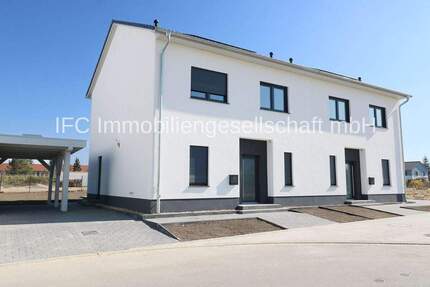 Energieeffiziente Neubau-DHH mit Carport und Stellplatz zur Miete in Dessau-Kochstedt - Verfügbarkeit: 2 von 6 - Dessau-Roßlau