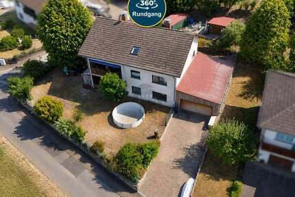 Haus zum Kaufen in Mücke Ruppertenrod 299.000,00 € 290 m² - Mücke / Ruppertenrod