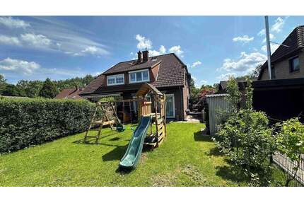 Modernisierte Doppelhaushälfte mit Carport in familienfreundlicher Wohnlage von Uetersen