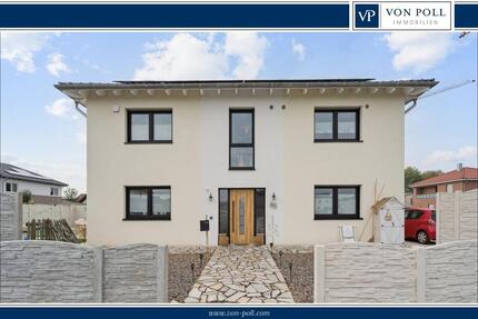 Attraktives Zweifamilienhaus in Olfen–modern, nachhaltig und mit KfW 40+ Standard