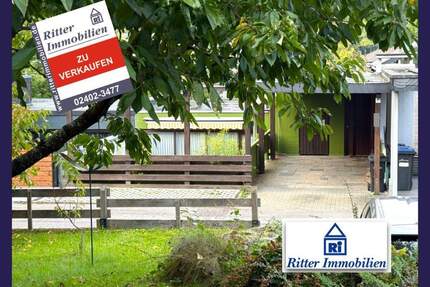 Ritter Immobilien e.K.: * * * In naturverbundener Lage, gemütliches EFH mit Garten u. Carport * * * - Stolberg Zweifall