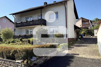 Gepflegtes Zweifamilienhaus mit Garten! - Hammelburg Diebach