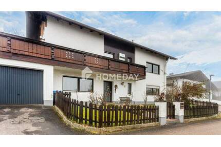 Großzügiges Zweifamilienhaus mit Kamin, Garten und Ausbaureserve - Kößlarn