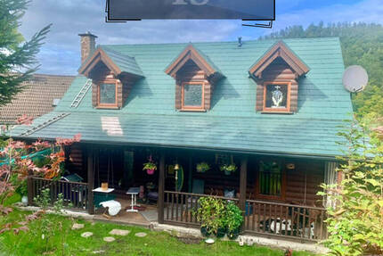 Amerikanisches Blockbohlenhaus Holzhaus Freistehendes Einfamilienhaus auf einem schön angelegten Grundstück in Schalksmühle (Strücken)