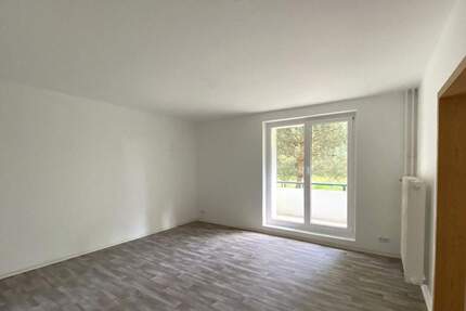 Sonnige Wohnung mit eigenem Garten, ideal geschnitten, ohne Provision - Rauen