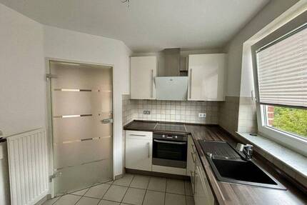 Helle 4-Zimmer-Wohnung im 1. Obergeschoss mit Gemeinschaftsgarten, Stellplatz und Keller in Horstmar