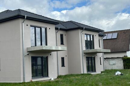 Moderne Neubau Wohnung mit Garten in Baesweiler