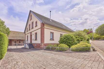 Haus zum Kaufen in Kottweiler-Schwanden 690.000,00 € 247.22 m²