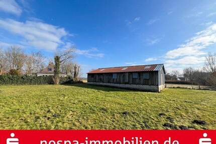 Großes Wohnbaugrundstück mit Restbausubstanz in Tating!