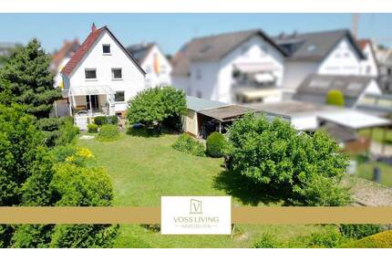 Charmantes Ein-Zweifamilienhaus in ruhiger Wohnlage mit Traumgrundstück, Sonnenterrasse + Garage - Dreieich Dreieichenhain
