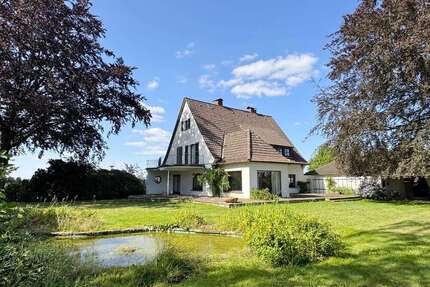Haus zum Kaufen in Lage 390.000,00 € 237.19 m²