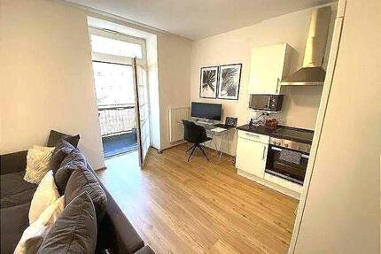 Frei ab sofort 2 - Zimmer-Wohnung im 1. Obergeschoss mit Aufzug Einbauküche Balkon - Bitburg