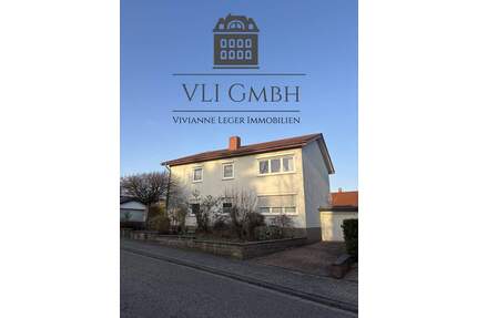 Zweifamilienhaus in St. Ingbert-Hassel - gepflegtes Wohnhaus mit großem Garten und flexibler Nutzung - Sankt Ingbert / Hassel